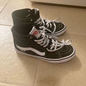 Vans Black and White High-Top Sneakers